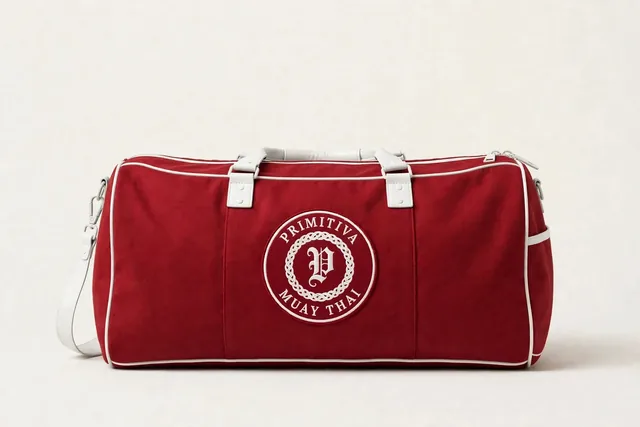Primitiva sac de sport WR en rouge et blanc avec l’emblème sur le panneau latéral