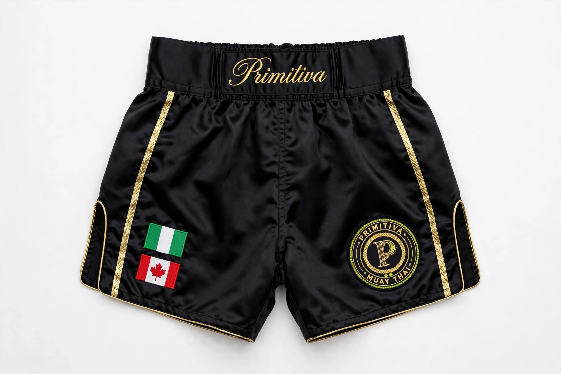 Primitiva fight shorts in black and gold with Nigeria and Canada flags and waistband script