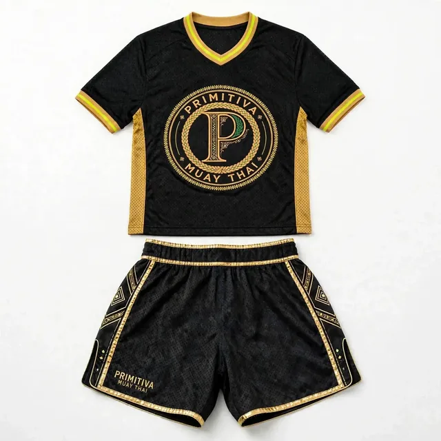Ensemble de maillot en filet Primitiva noir et doré avec short assorti et grand emblème